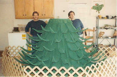 David (Right) and friend Mark (Left) posing with covered tree bottom.